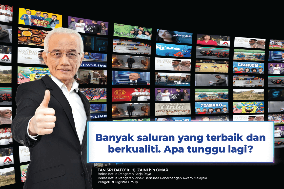 An old man wearing glasses, in a black suit and giving a thumbs up, stands in front of a collage of various TV screens